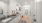 a bathroom with white cabinets