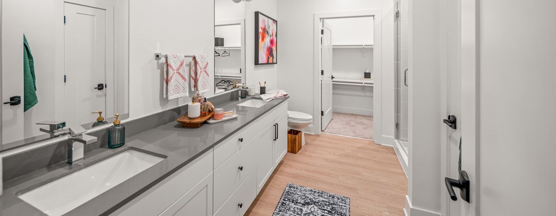 Spacious kitchens with thoughtful details a bathroom with white cabinets
