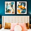 a bedroom with a bed and two nightstands
