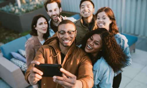 a group of people posing for a photo